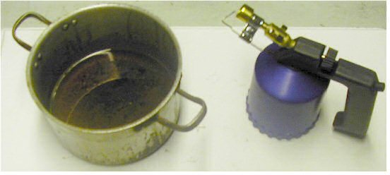 Dypping av beslag i linolje propangass eller gassbrenner